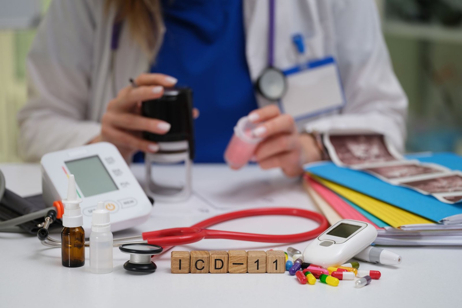 ICD code blocks beside a stethoscope and clinical notes