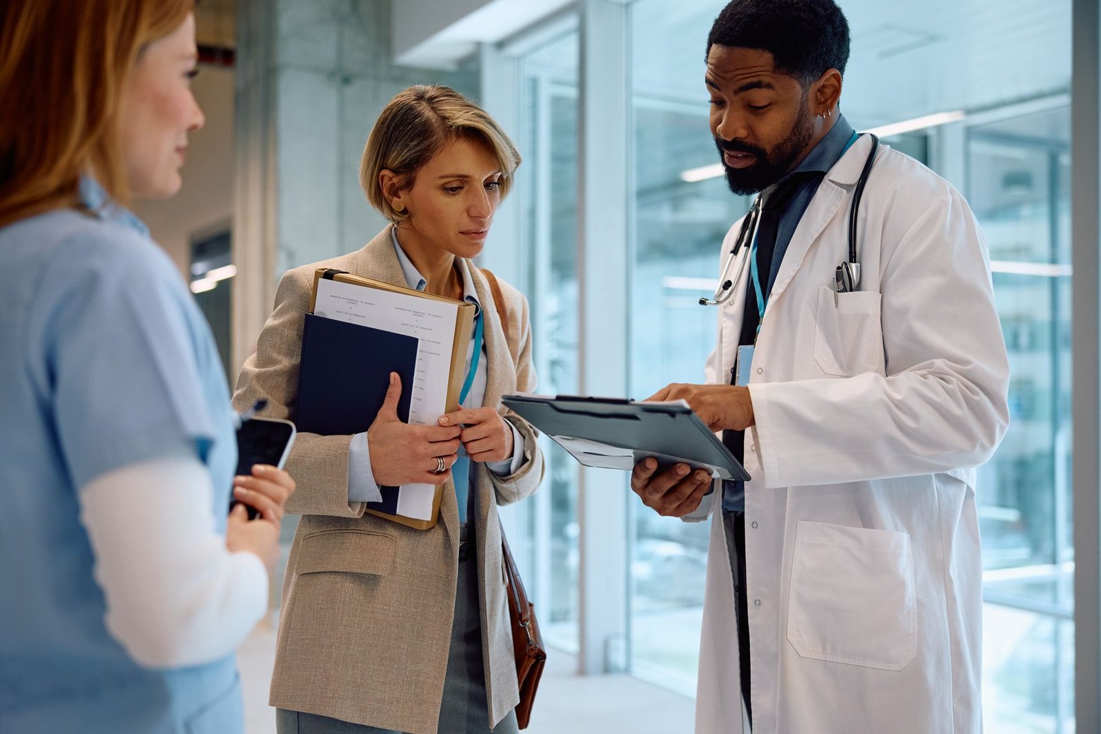 Clinician and patient discussing costs before treatment